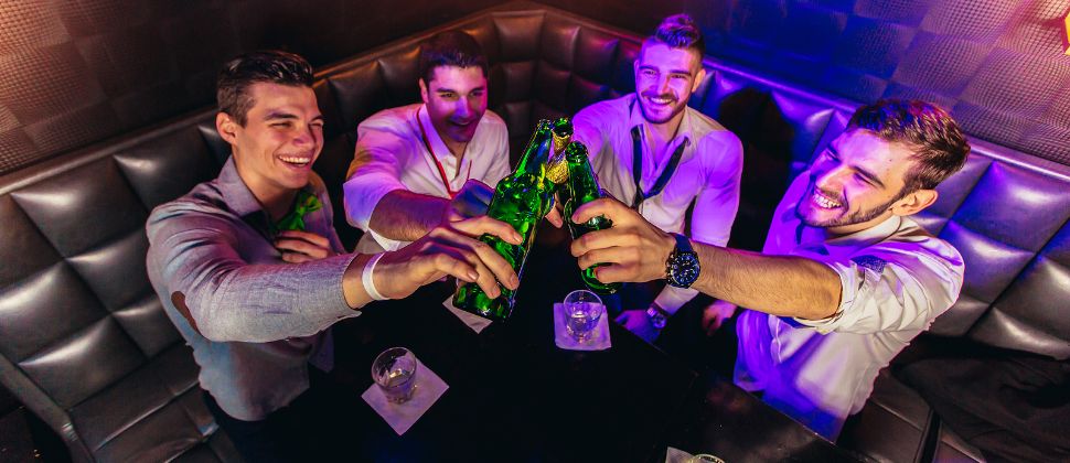 A Bachelor Party Raises A Toast In A Las Vegas Nightclub.